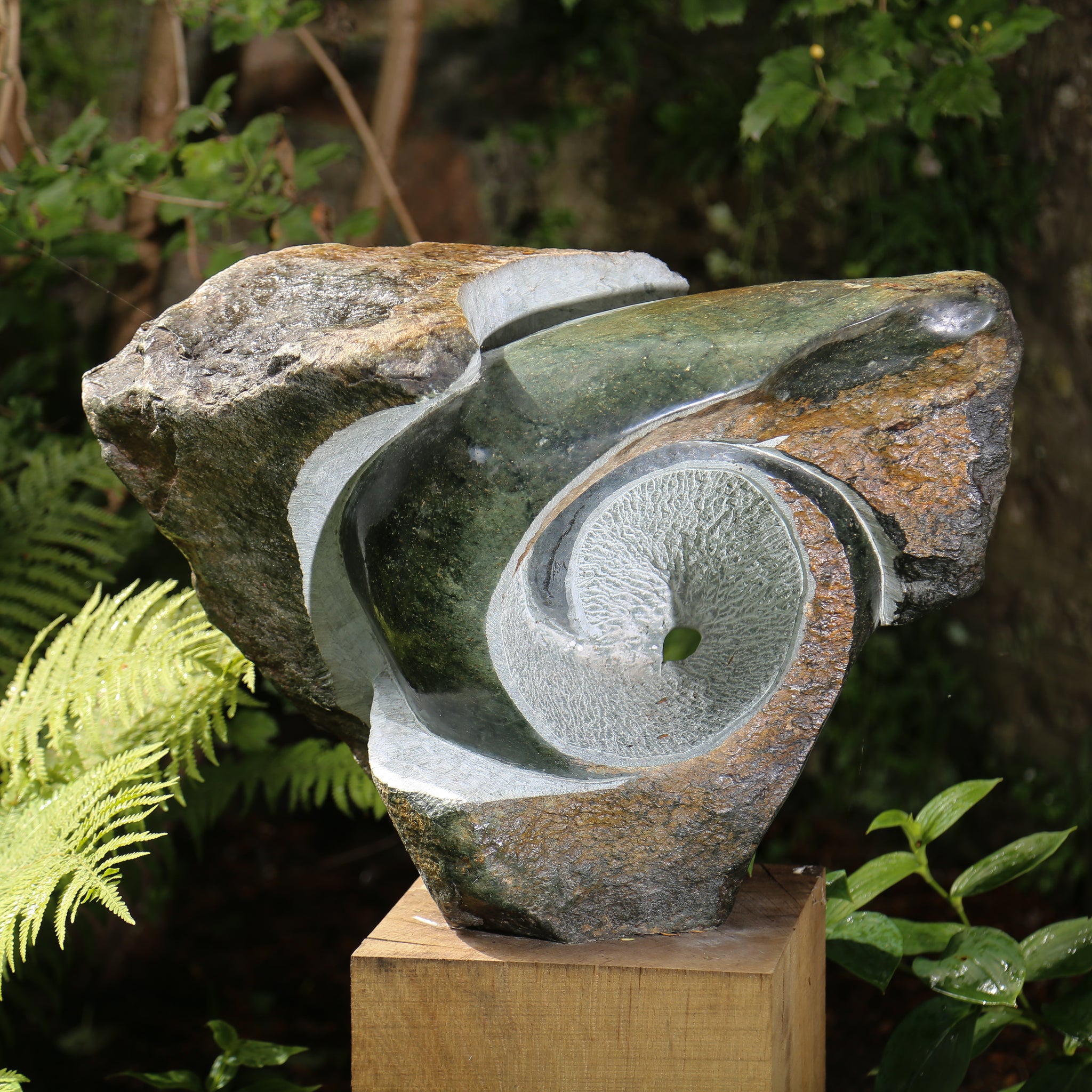 hand carved stone garden sculpture
